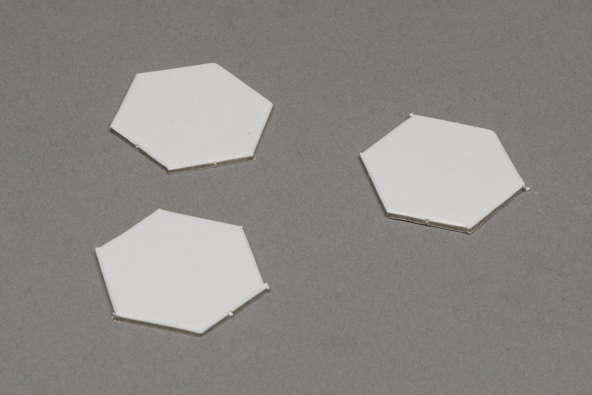 Individual cardboard tokens below 2,000 pcs