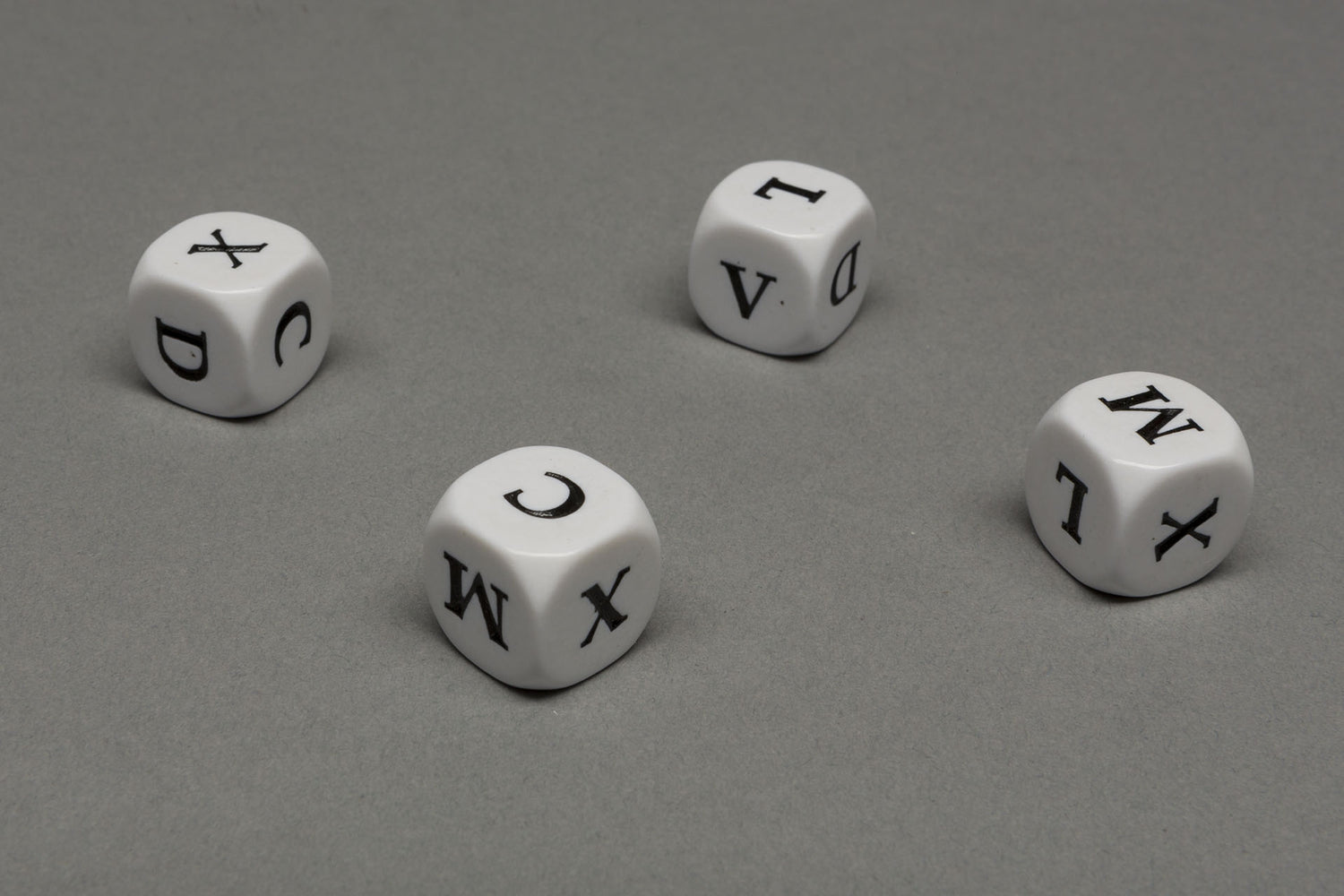 Dice with Roman numbers V - M