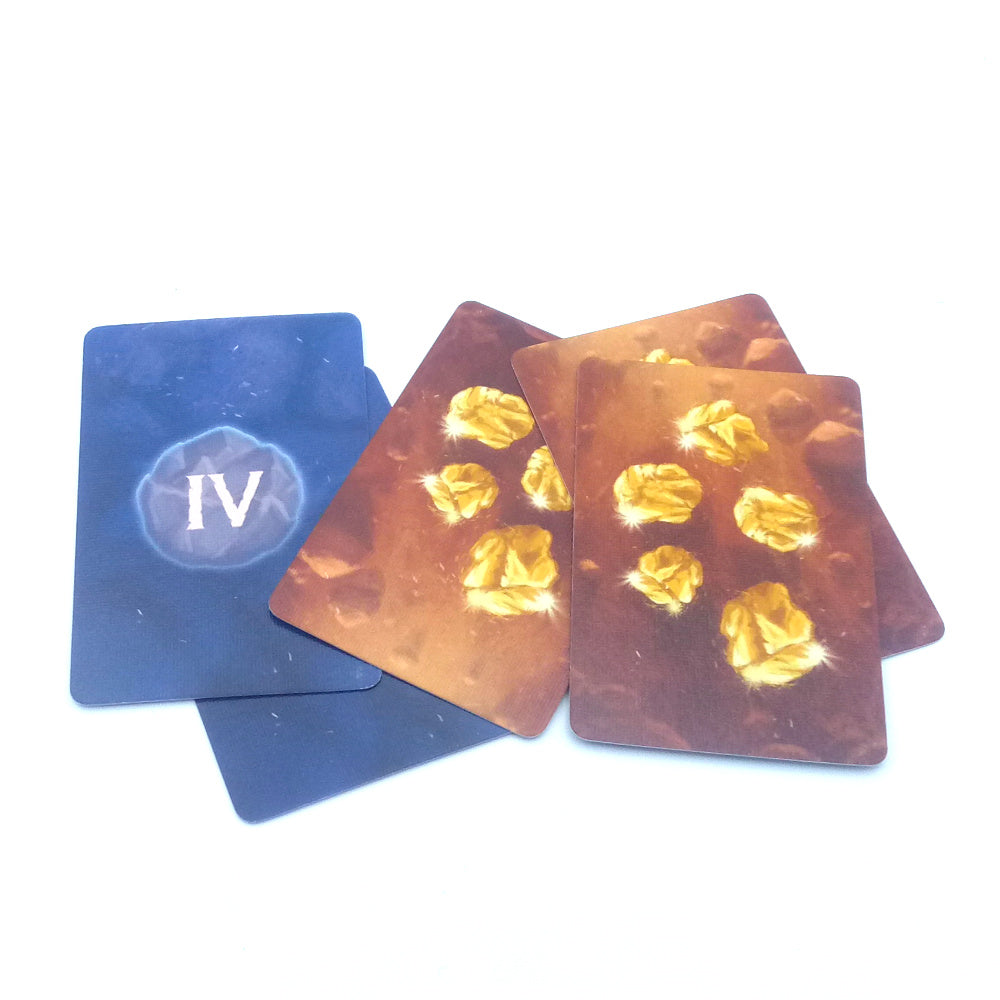 Set playing cards with gold nuggets