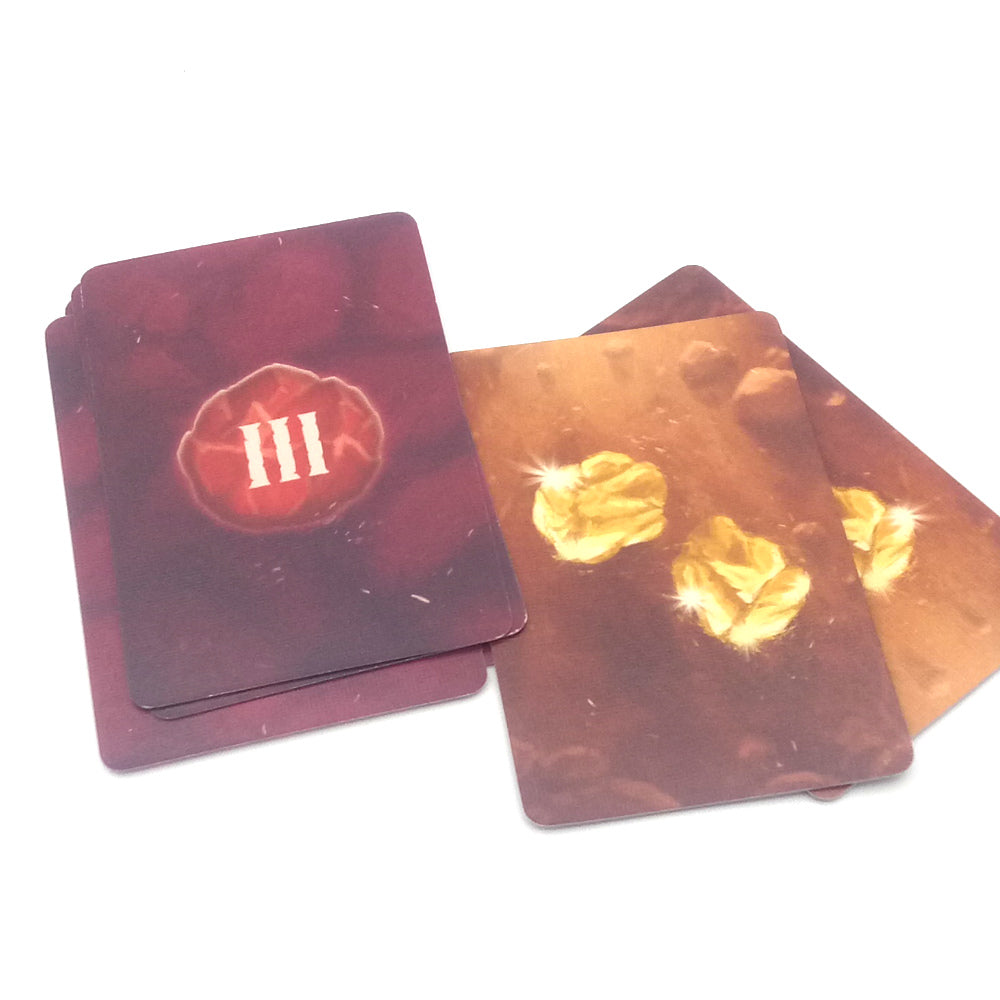 Set playing cards with gold nuggets