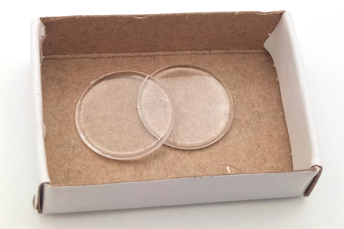 approx. 100 plastic chips 20mm transparent (52 gr.)