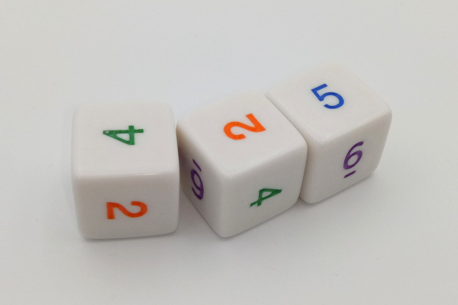 Plastic dice colored