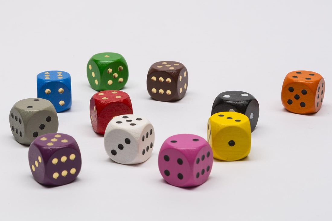 Wooden dice with golden dots